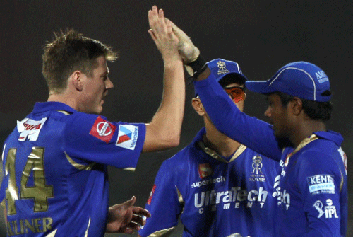 Rajasthan Royals players celebrate the wicket of Pune Warriors' R Utappa during an IPL 6 match in Jaipur on Sunday . PTI Photo.