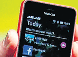 Nokia pushes $99 phone to retain market pie