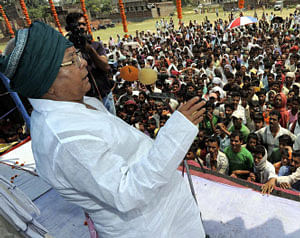 RJD chief Lalu Prasad addresses a public meeting at Nauwatpur near Patna on Monday. PTI Photo