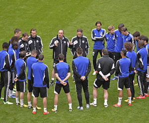 Chelsea's coach Rafael Benitez, from Spain, center, gestures as he talks to his players during a training ahead of Wednesday's Europa League final match against Chelsea at ArenA stadium in Amsterdam, Netherlands, Tuesday May 14, 2013. AP Photo