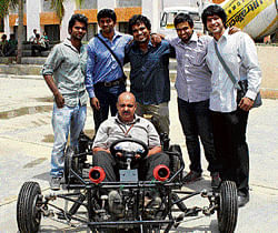applying thoughts The team of four students, along with their guide, Dr S Kiran Aithal, and their car. DH photo