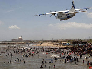 In this photograph taken on September 13, 2013 a Dornier surveillance aircraft deployed by the Indian Coast Guard (ICG) on the beach at Idinthakarai village in southern Tamil Nadu. AFP