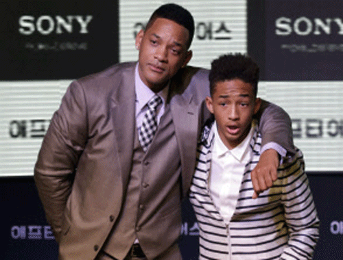File image: U.S. actor Will Smith and his son Jaden pose for the media during the premiere event of their new film 'After Earth' in Seoul, South Korea, Tuesday, May 7, 2013. AP