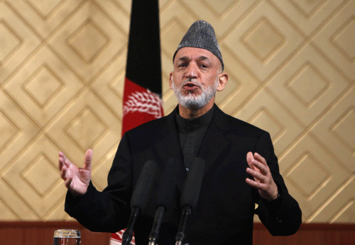 Afghan President Hamid Karzai speaks during a ceremony to mark the 80th anniversary of Kabul University in Kabul