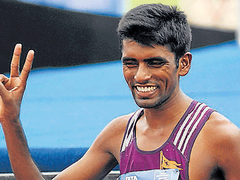 Desi talent: Suresh Kumar Patel won the women's and men's races for Indian runners. DH photo .