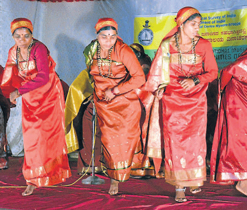 Tribals present a dance on International Museum Day, at Kaveri Kalashektra in Madikeri. (