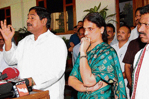 Dharmana and Sabitha address the media outside Andhra Pradesh chief minister's residence on Monday. Chary