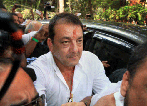 Bollywood actor Sanjay Dutt reaches the designated TADA court to surrender in the 1993 serial blasts case in Mumbai on Thursday. PTI Photo
