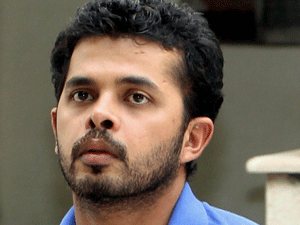 Indian cricketer Shantakumaran Sreesanth walks towards a court in New Delhi, India, Tuesday, May 21, 2013. India's top court has asked the Board of Control for Cricket in India (BCCI) to wrap up in two weeks its investigation into alleged spot-fixing in the ongoing domestic Twenty20 league. Three players, including Sreesanth, were arrested last week by Delhi police in the case and suspended by the BCCI. (AP Photo)