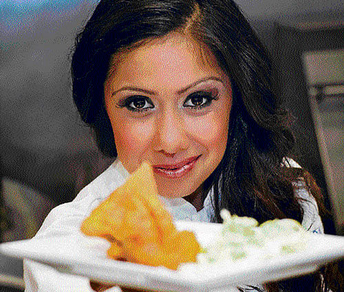 Snack on these: Suzy Singh; and samosas. PHOTO&#8200;by span