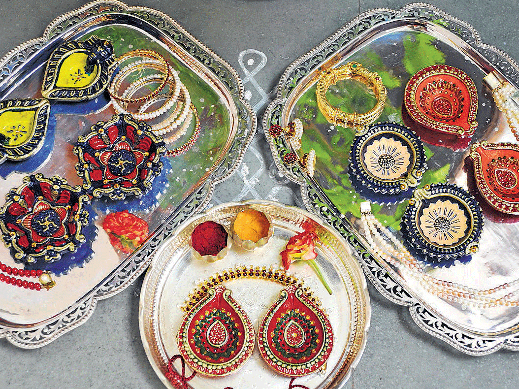 Ethnic : The decorated diyas. dh photo by Srikanta Sharma R