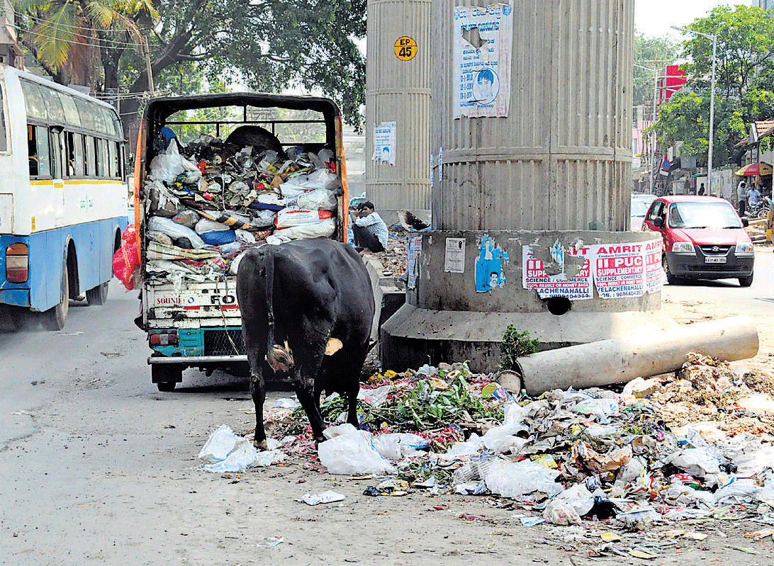 Raising a stink : The space under the Metro near Banashankari is being used to dump garbage. dh photo by S K Dinesh