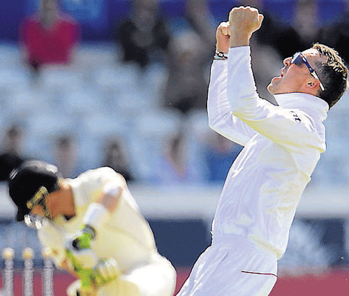 ecstatic England off-spinner Graeme Swann celebrates the dismissal of Martin Guptill on Sunday. Reuters