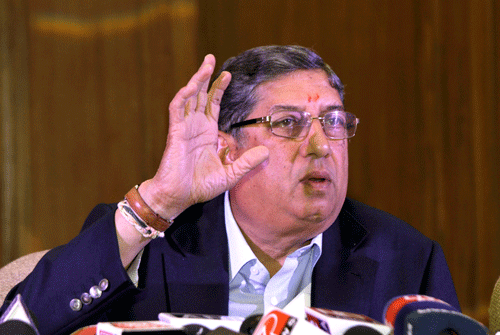 BCCI chief Narainswamy Srinivasan gestures during a press conference in Kolkata, Sunday, May 26, 2013. Srinivasan said on Sunday a committee will look into allegations against his son-in-law and Chennai Super Kings official Gurunath Meiyappan after his arrest during investigations for spot-fixing by police. (AP Photo