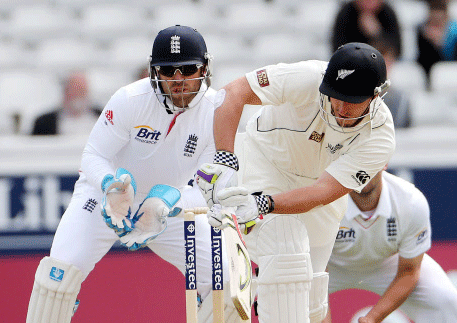 New Zealand's Hamish Rutherford, play's a shot off a ball bowled by England's Graeme Swan but is caught out by Joe Root on the fourth day of the second Test match between England and New Zealand at Headingley cricket ground in Leeds, England, Monday, May 27, 2013. AP Photo.