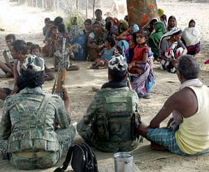 A Naxal group's Jan Adalat (people's court) in a Maoist-hit village in Latehar on Saturday. PTI Photo