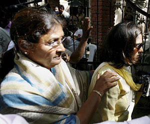 Gurunath Meiyappan's wife Rupa and his mother Lalitha arrive at the crime branch office to meet him in Mumbai on Tuesday. Meiyappan has been arrested in connection with IPL spot-fixing scandal. PTI Photo