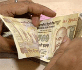 Rupee trims early gains against dollar, still up by 3 paise