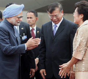 Prime Minister Manmohan Singh being received by Thailand's Deputy Prime Minister Yukol Limlamthong and his wife upon his arrival at Don Mueang International Airport, Bangkok in Thailand on Thursday. PTI Photo