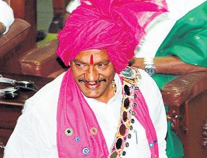 BJP MLA from Aurad, Prabhu Chavan, decked up in ethnic Lambani attire, arrives at the Assembly session in Bangalore on Thursday. dh photo