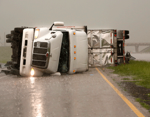 Overturned trucks block a frontage road off I-40 just east of 81 in El Reno, Okla., after a tornado moved through the area on Friday, May 31, 2013. AP Photo