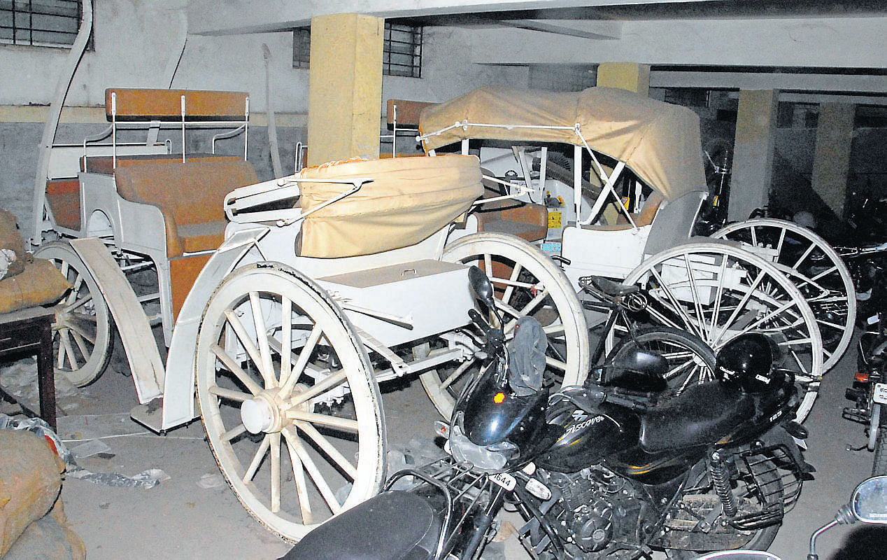 Two chariots parked at the cellar of Mysore City Corporation (MCC). dh photo