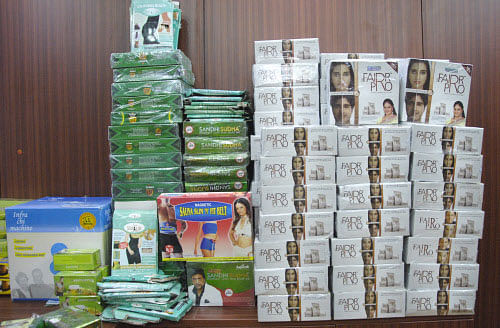 CCB seized Fake Products displayed at Central Crime Branch Office during the Press conference, in Bangalore on Sunday. CCB Photo