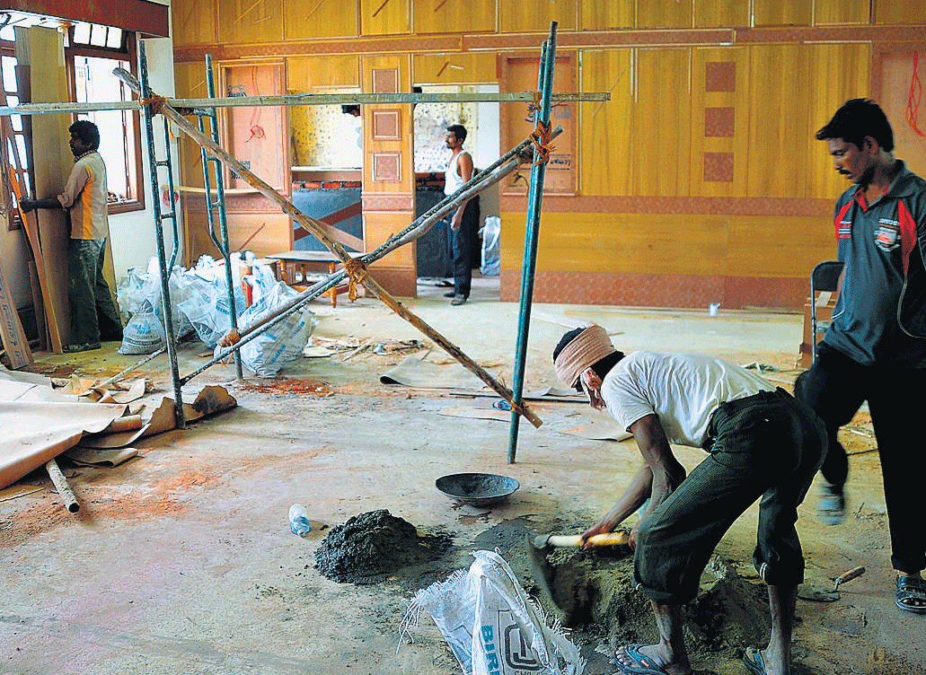 In a shambles: The renovation work is going on in the chamber of Forest Minister  B Ramanath Rai at Vidhana Soudha in Bangalore on Wednesday. dh photo