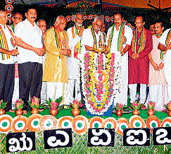 Karnataka State Kannada Sahitya Parishat President                        Pundalika Halambi inaugurates the Udupi district Kannada Sahithya Sammelana in Hebri on Thursday. Sammelan                     President Ambathanaya Mudradi among others look on. DH Photo
