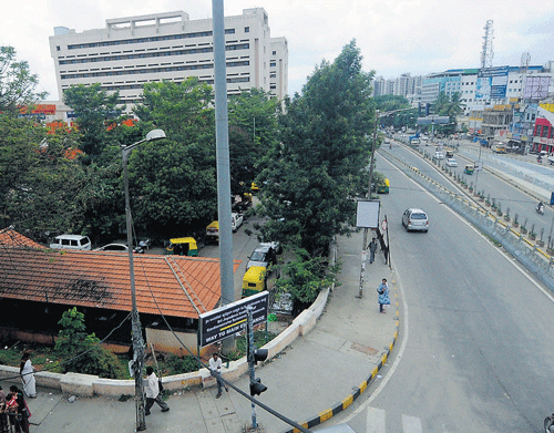 CENTRE OF CONTROVERSY: The proposed Namma Metro intersection near Jayadeva Hospital on Bannerghatta Road will be realigned, displacing hundreds of families. DH PHOTO