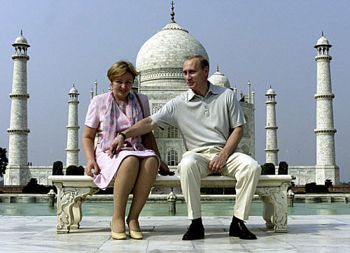 Russian President Vladimir Putin and his wife Lyudmila sit in front of the Taj Mahal while touring the city of Agra in this October 4, 2000 file photograph. Putin and his wife said on state television on Thursday that they had separated and their marriage was over after 30 years. REUTERS