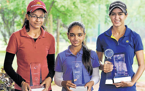 champions (From left) Amrita Anand (Category B), Ananya Barthakur (Category C) and Gurbani Singh (Ladies and  Category A) pose with their spoils. DH photo