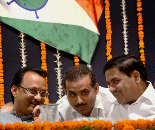 Nationalist Congress Party (NCP) leaders Ajit Pawar, Rajendra Tope and R R Patil during the 14th anniversary celebrations of the Nationalist Congress Party in Mumbai on Friday. PTI Photo