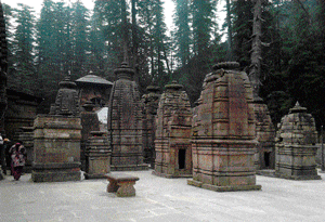 e Jageshwar temple complex surrounded by tall deodar trees.