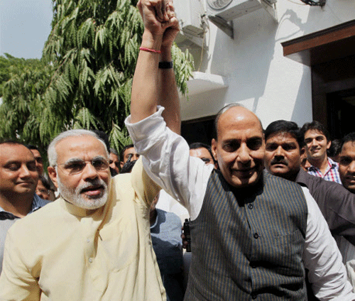 File Photo - BJP President Rajnath Singh with Gujarat CM Narendra Modi after a meeting at his residence in New Delhi on Wednesday (5th June 2013 PTI File Photo
