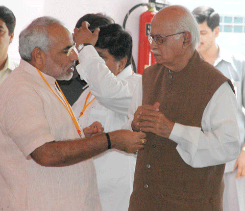 BJP's 2014 poll campaign chairman, Narendra Modi abd BJP senior lead LK Advani DHNS Photo