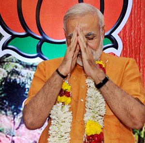 Gujarat Chief Minister Narendra Modi gestures after being anointed as Chairman of BJP Election Campaign Committee for 2014 polls at the party's National Executive meeting in Panaji, Goa on Sunday. PTI Photo