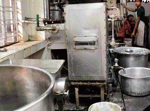 Health risk: One of the kitchens of a restaurant on Church Street.   DH Photo by Janardhan B K