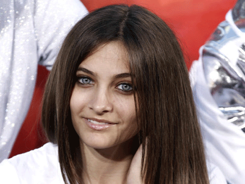 FILE - This Jan. 26, 2012 file photo shows Paris Jackson, daughter of the late pop icon Michael Jackson, during the hand and footprint ceremony honoring her father at Grauman's Chinese Theatre in Los Angeles. Jackson is physically fine after being taken to a hospital early Wednesday, June 5, 2013, an attorney for Jackson's mother said. Perry Sanders Jr. writes in a statement that Paris Jackson is getting appropriate medical attention and the family is seeking privacy. Fire and sheriff's officials confirmed they transported someone from a home in Paris' suburban Calabasas neighborhood for a possible overdose but did not release any identifying information or additional details. AP Photo
