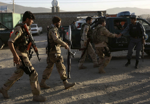 Afghan security forces arrive at the site of an attack in Kabul Reuters
