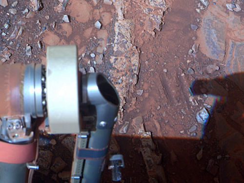 This image provided by NASA shows a rock that the NASA Mars rover Opportunity recently examined. The six-wheel, solar-powered rover is leaving its current location in Endeavour Crater and headed for a new spot ahead of the next Martian winter. AP Photo