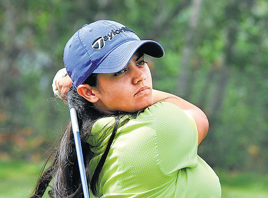 in control Astha Madan watches her shot during the opening round of the Junior Girls tourney on Monday. DH photo