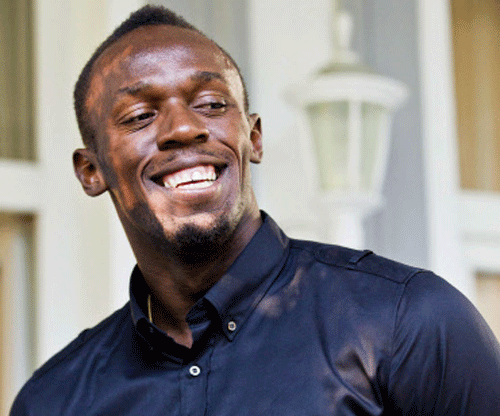 Sprinting champion Usain Bolt of Jamaica smiles as he meets the press at a news conference at the Russian embassy Reuters Image