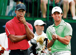 Star attractions: Golfing fans have a treat in store when the great Tiger Woods (left) and his heir apparent Rory McIlroy tee off together in Thursday's opening round of the US Open at Merion&#8200;Golf Club. reuters
