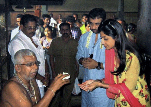 Actor Shilpa Shetty and her husband, Raj Kundra, getting 'prasad' at the Kateel Sri Durga Parameshwari temple in Mangalore PTI File Image
