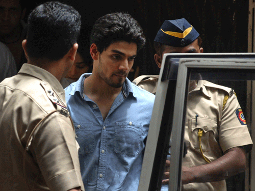 Suraj Pancholi, the son of Bollywood couple Aditya Pancholi and Zarina Wahab is escorted by police as he leaves after appearing before a court in Mumbai, India, Tuesday, June 11, 2013. Pancholi, has been arrested on suspicion of abetting the suicide of his girlfriend, actress Jiah Khan, police said. Khan, 25, committed suicide at her home in Mumbai last week. AP File Image