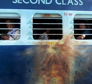 A damaged coach of Dhanbad-Patna Intercity Express train which was attacked by suspected Maoists near Kundhar halt in Jamui district of Bihar on Thursday. PTI Photo