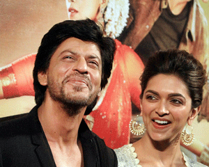 Bollywood actor Shahrukh Khan and Deepika Padukone during the trailer launch of their upcoming movie 'Chennai Express' in Mumbai on Thursday. PTI Photo