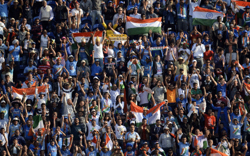 Fans cheer as India wins their ICC Champions Trophy group B match against South Africa at Cardiff Wales Stadium in Cardiff, Wales June 6, 2013. REUTERS