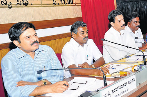 ZP CEO K N Vijayaprakash, ZP President Koragappa Naik, MP Nalin Kumar Kateel among           others at the Zilla Panchayat general body meeting in Mangalore on Thursday.
